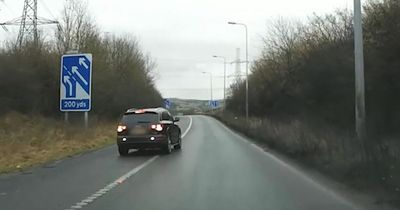 Audi spotted reversing back down motorway slip road