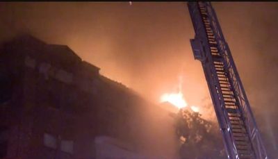 At least one person dead and 18 families displaced after huge blaze engulfs New Jersey apartment block