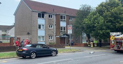 Road cordoned off by police after serious flat fire in Swansea