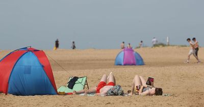 Two beach show-offs rescued by lifeguards after trying to impress group of women