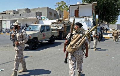 Armed groups clash in Libya capital, killing 13