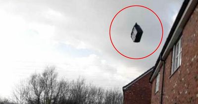 Man gobsmacked by 'proof of delivery' snap showing parcel flying over his fence