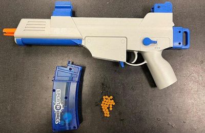 Off-duty officer charged after killing teen holding a water gun