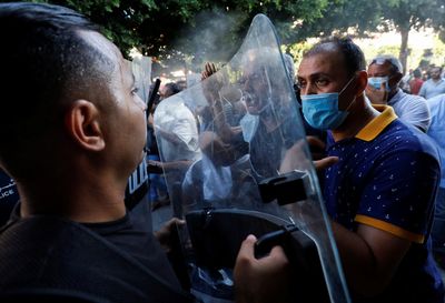 Police arrest leading gay activist in crackdown on Tunisia rally