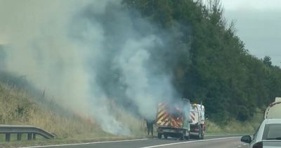 Dramatic footage captures moment van engulfed in flames on M90 as fire crews rush to tackle blaze