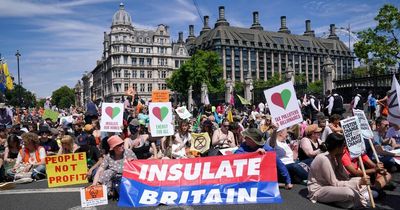 Hundreds sit-in outside Parliament to protest climate change and cost of living