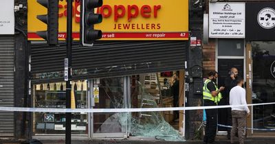 "We just heard banging and shouting and everyone ran outside": Alarming moment car smashes into jewellery store in front of shocked bystanders during Curry Mile 'armed robbery'