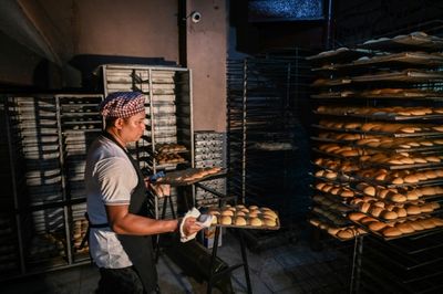 Philippine bakeries shrink 'poor man's bread' as inflation bites