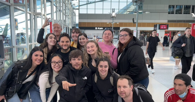 Louis Tomlinson photobombed by Celtic icon as Parkhead fans pick out 'real superstar' in airport pic