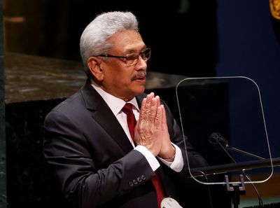 Rights group seeks arrest of ex-Sri Lanka president in Singapore