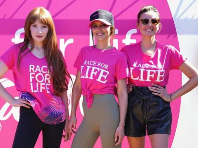 Girls Aloud take part in Race for Life in memory of Sarah Harding: ‘It doesn’t feel like she’s gone’