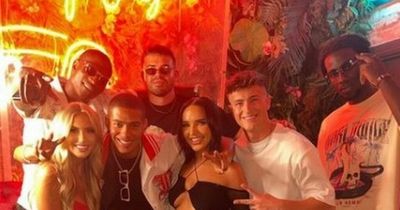 Dumped Love Islanders reunite for boozy night in Manchester as they fling cash in the air