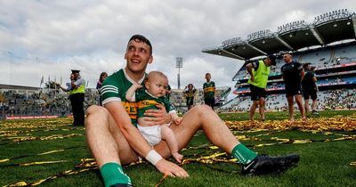 David Clifford celebrates with his baby son after breakthrough All-Ireland with Kerry