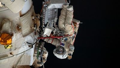 Russian and European astronauts make rare spacewalk