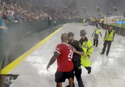 A.J. Dillon clarifies strange Lambeau Leap situation with police officer at Man City-Bayern Munich match