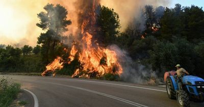 Villages evacuated as huge fire burns near Greece's historic Ancient Olympia