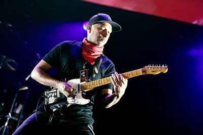 Rage Against the Machine’s Tom Morello accidentally tackled by security after fan rushes on stage