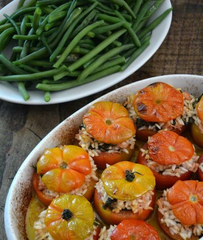 Rachel Roddy’s recipe for tomatoes stuffed with rice, tuna and anchovy