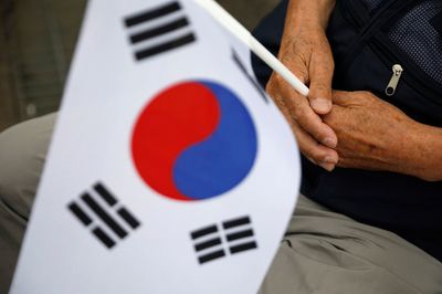 South Korean government, police clash on oversight