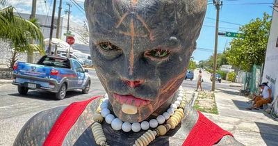 Tattoo addict who has transformed into 'black alien' wants to amputate his leg