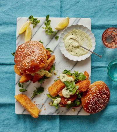 Thomasina Miers’ recipe for breaded haddock bun with roast chilli aïoli and watercress