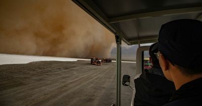 Apocalyptic sandstorm blocks out sun and turns sky orange as it fills the air