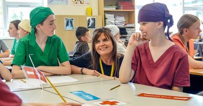 The future of the NHS? Pupils dress in surgical scrubs to find out more about working in health and social care