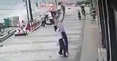 Hero catches toddler falling from fifth floor window as he walks back to work