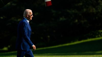 Biden's COVID symptoms "almost completely resolved," doctor says