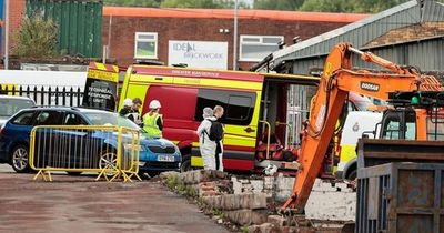 Human remains found by demolition workers at burnt out mill in 'major incident'