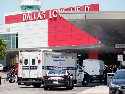 Dallas airport shooting: Woman shot by police after opening fire at Love Field, law enforcement says