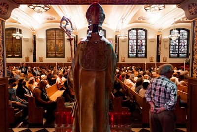 AP PHOTOS: Parishioners, pilgrims flock to Brooklyn festival