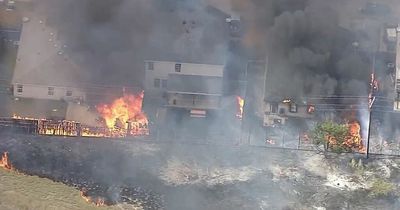 Huge blaze rips down at least 9 homes in apocalyptic scene started by grass fire