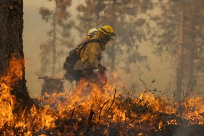 Firefighters tackle California wildfire as heat grips parts of US