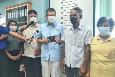 Living 'dead' man gets long delayed new ID card