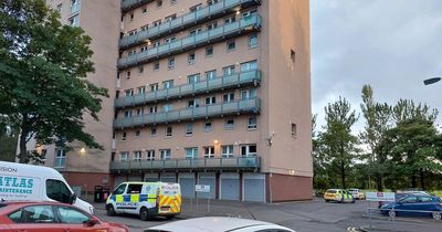 Man dies at Glasgow high rise flats as police tape off area
