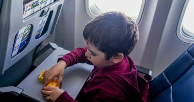 Keep kids happy on a lengthy flight with these top travel tips