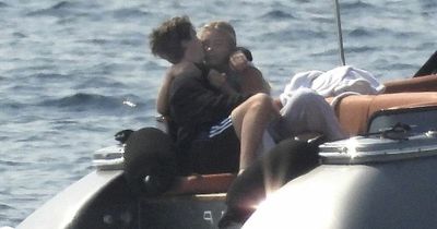 Cruz Beckham kisses his new girlfriend on £1.6m a week yacht break with famous family
