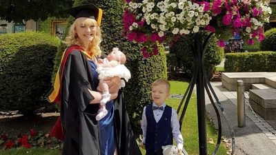 Mom Who Was Told She’d Never Have Kids Graduated With A Master’s With Her Two Children Beside Her