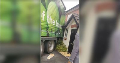 Huge Asda lorry crashes into two homes 'while trying to reverse out of cul-de-sac'