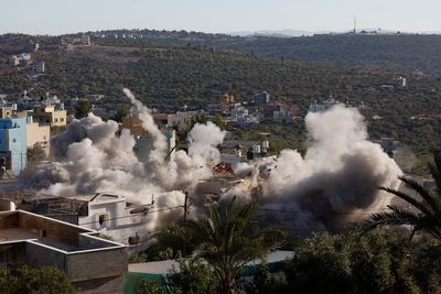 Israeli forces demolish houses of accused Palestinian gunmen