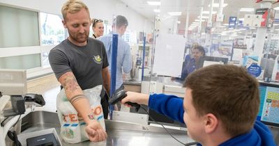Dad-of-seven gets Tesco Clubcard tattooed on his arm