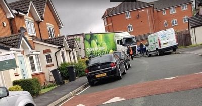 Massive Asda truck smashes into two houses while 'trying to reverse out of cul-de-sac'