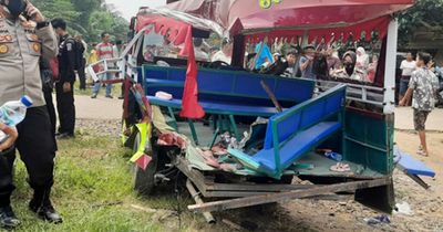 Nine people including three children killed as train smashes into amusement park ride
