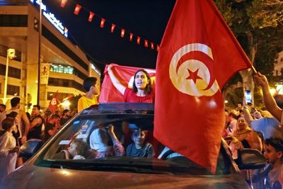 Tunisia set for new constitution after vote with low turnout