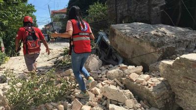 At least five dead and dozens injured after magnitude-7 earthquake triggers landslides in northern Philippines