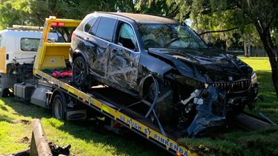 Seven teens arrested after SUV crashes into Oxley house following report of dangerous driving 150km away in Blackbutt