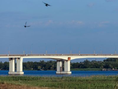 Ukraine forces strike key bridge in Russian-occupied south