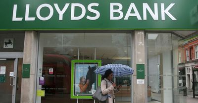 Lloyds profits fall as it sets aside £377m for loan defaults over living costs