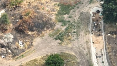 Ukrainian Troops Show Charred Remains Of Russian Military Gear Scattered Across Battlefield